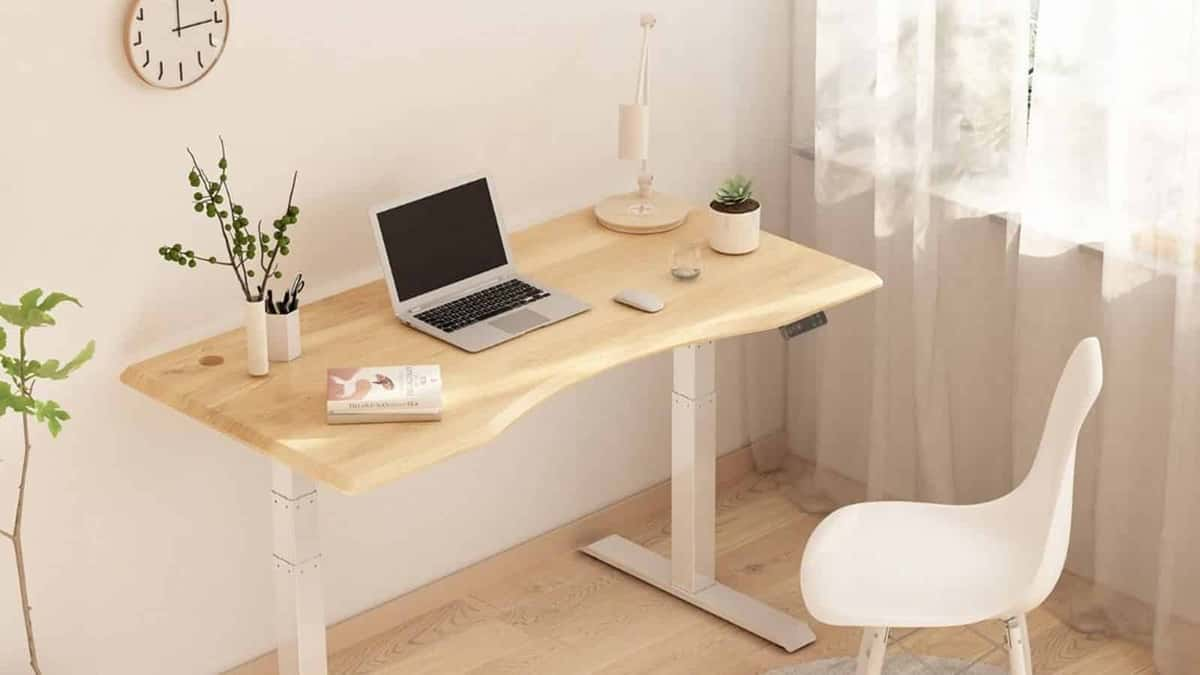 A promotional image of the Flexispot E7 Standing Desk