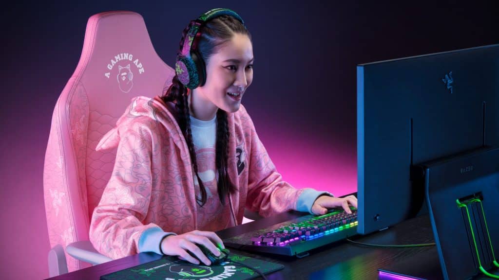 A woman in Razer X Bape gear on a PC