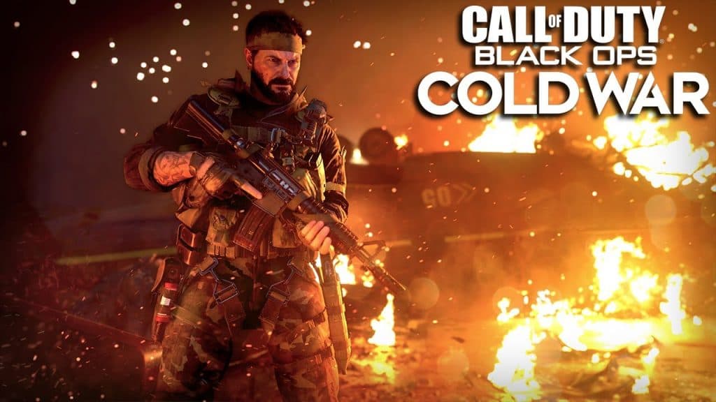 CoD Black Ops Cold War operator in front of burning building