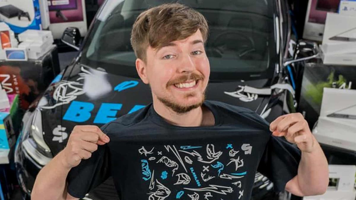 MrBeast holding up t shirt