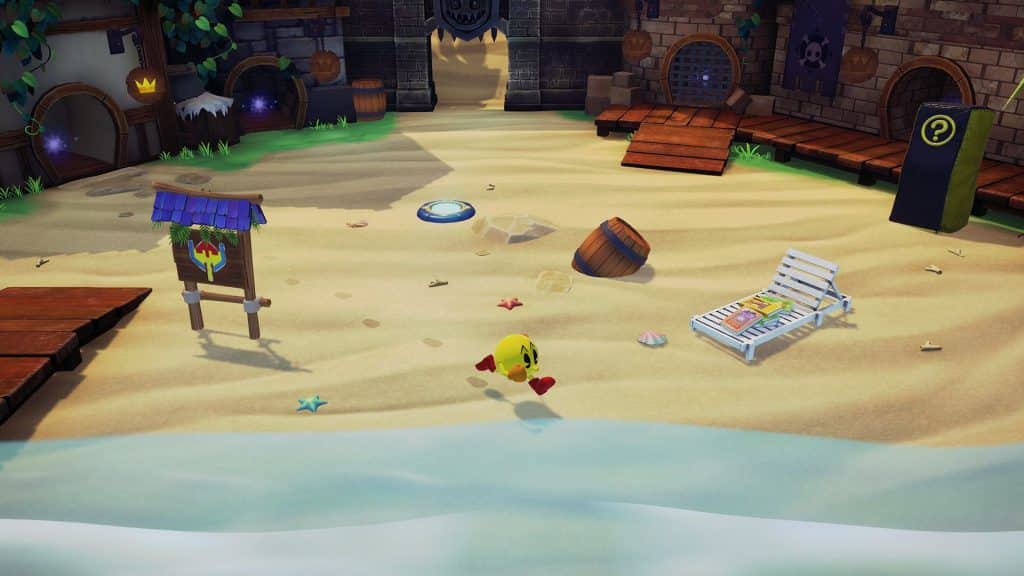 pac-man running on beach in pac-man world re-pac