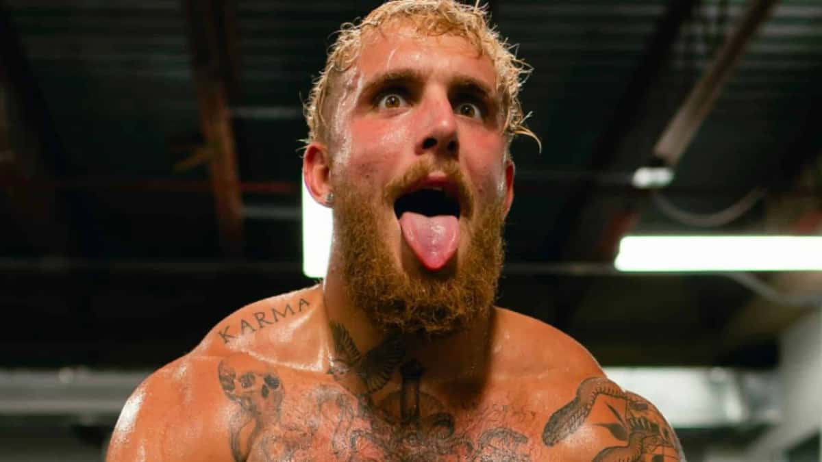 Jake Paul with tongue out in boxing gym