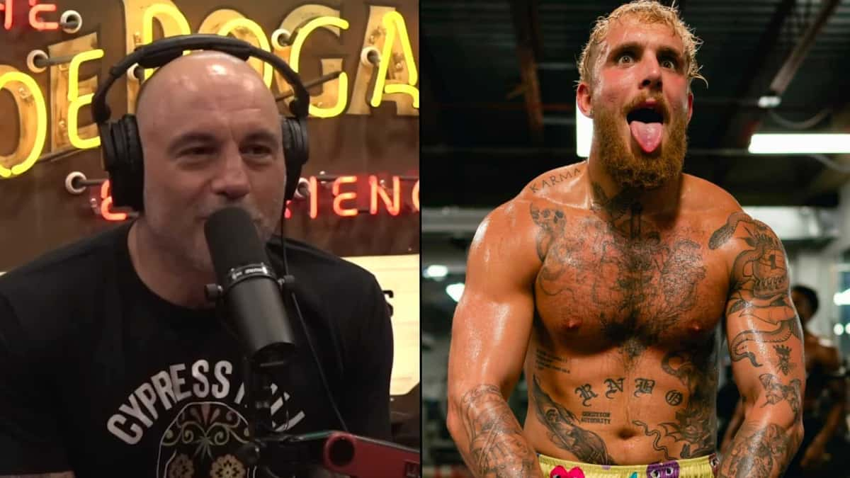 Joe Rogan alongside Jake Paul posing in boxing gym