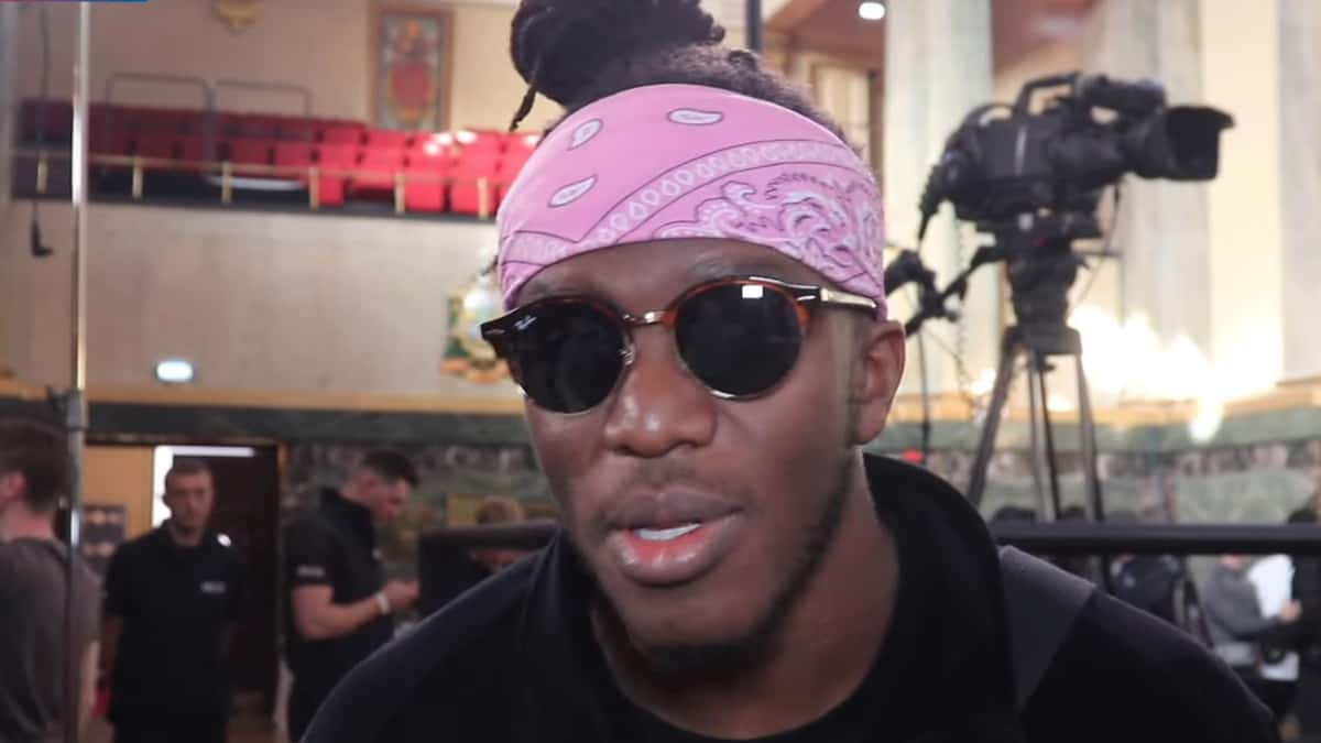 KSI talking to camera in sunglasses and pink bandana