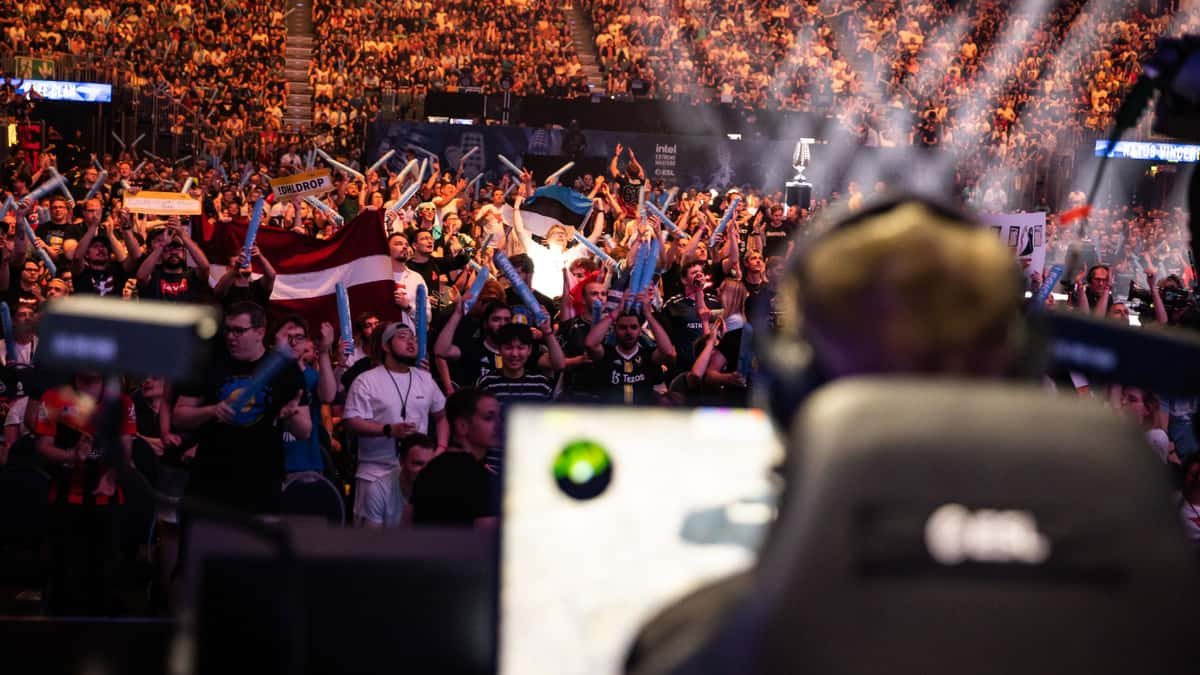 esports pros compete on stage