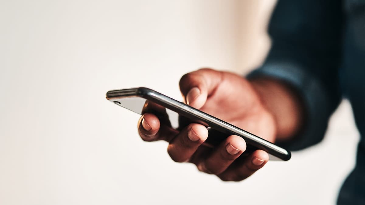 woman holding phone