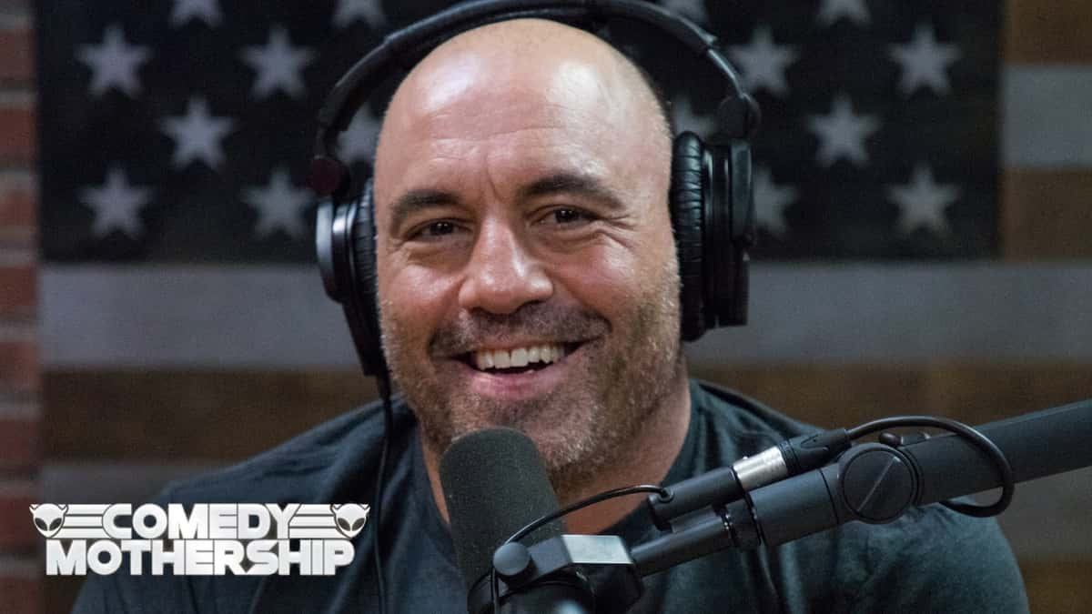 Joe Rogan smiling on podcast, with Comedy Mothership logo on bottom right corner