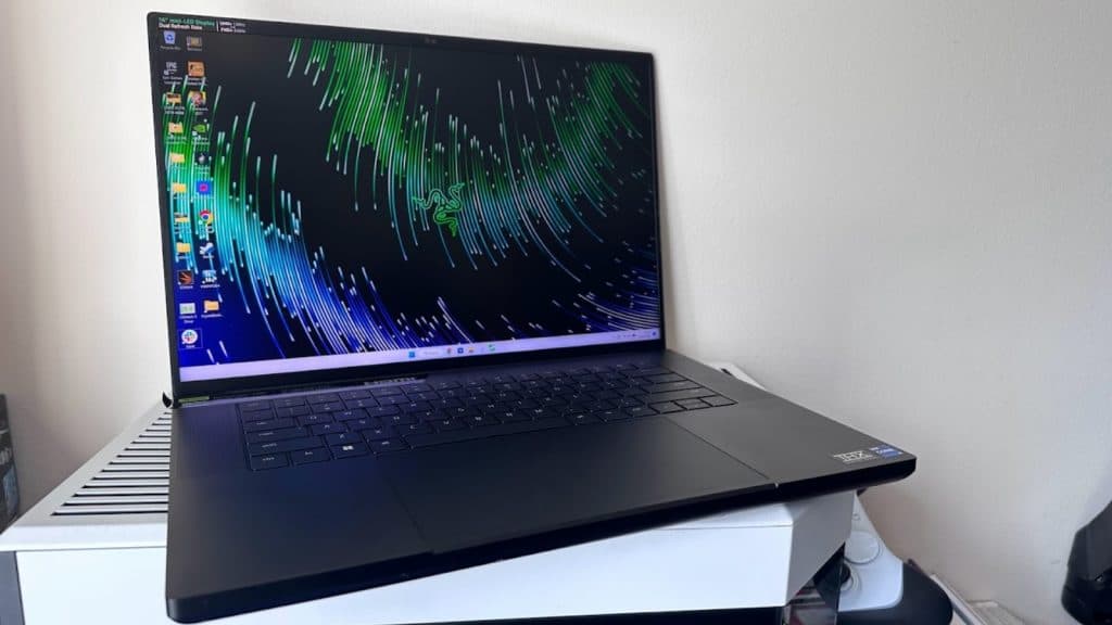 The Razer Blade 16 laptop open on its desktop