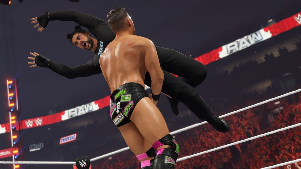 bad bunny doing a running crossbody on the miz in wwe 2k23