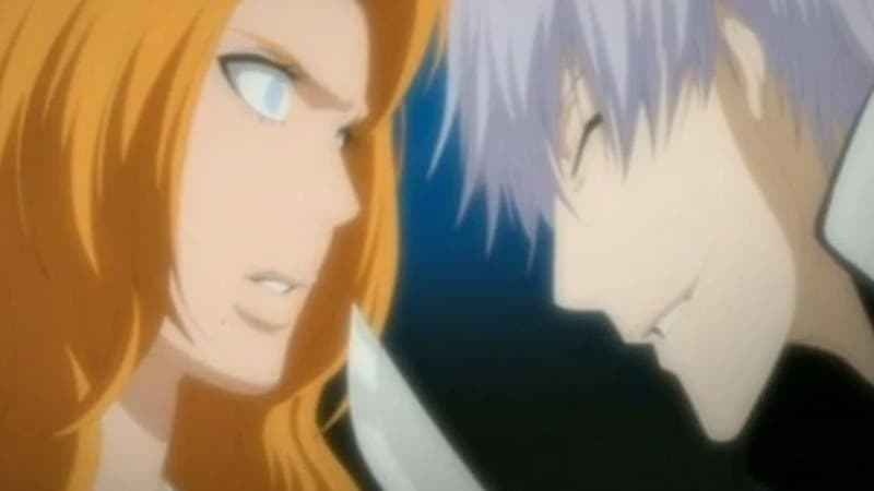 An image of Gin threatening Rangiku in Bleach