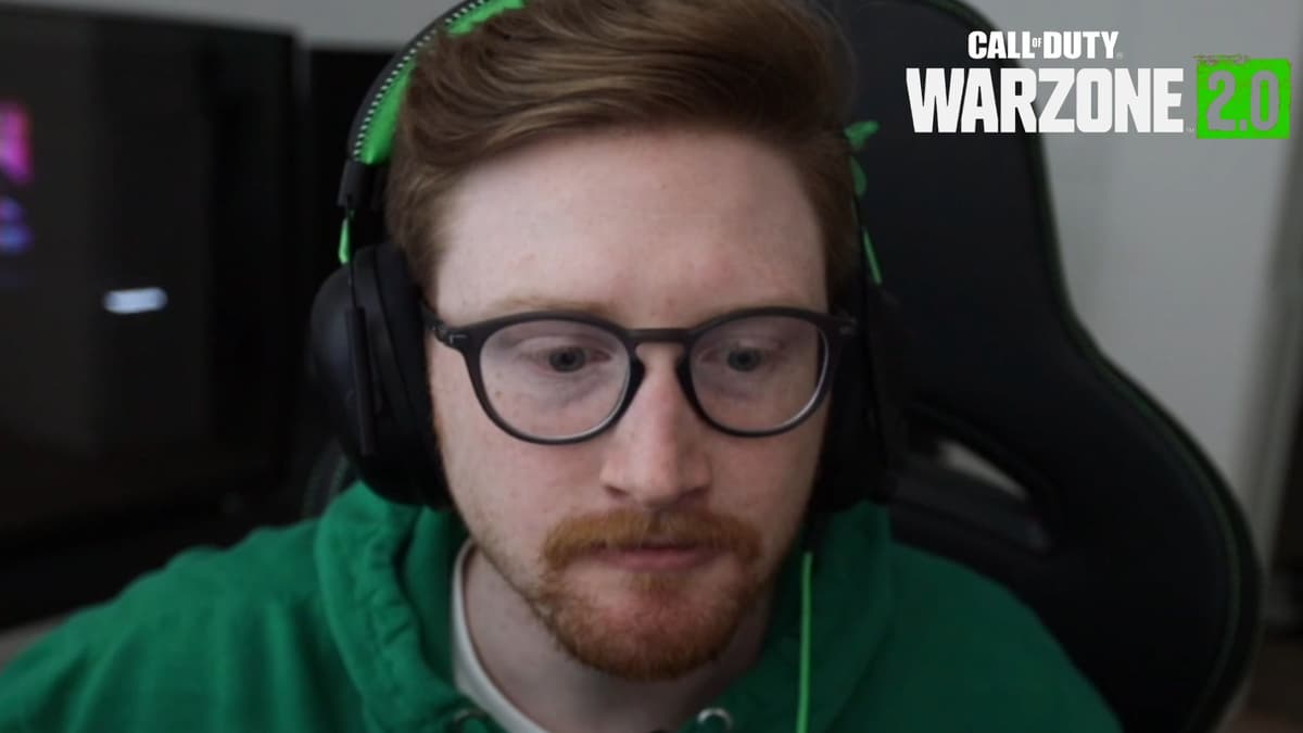 Scump in green jumper talking to camera