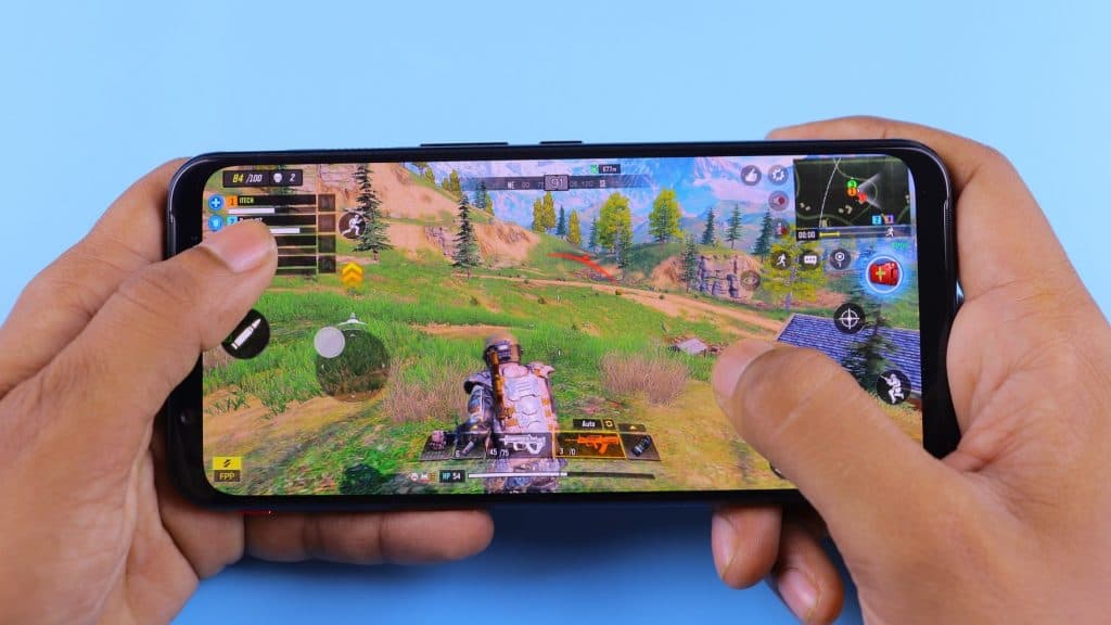 Image of someone playing games on a mobile phone