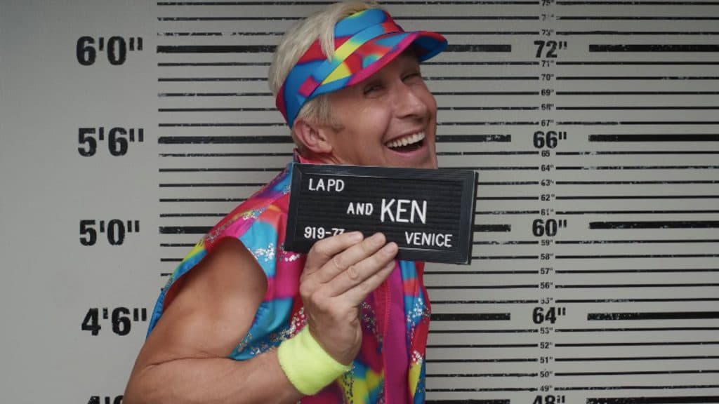 Ryan Gosling as Ken poses for his mugshot in Barbie