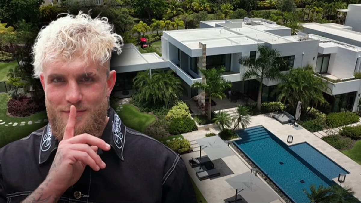 Jake Paul poses in front of his massive mansion in Puerto Rico.