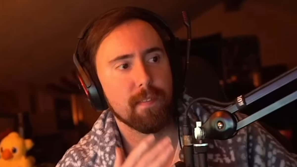 Asmongold sat at setup wearing robe