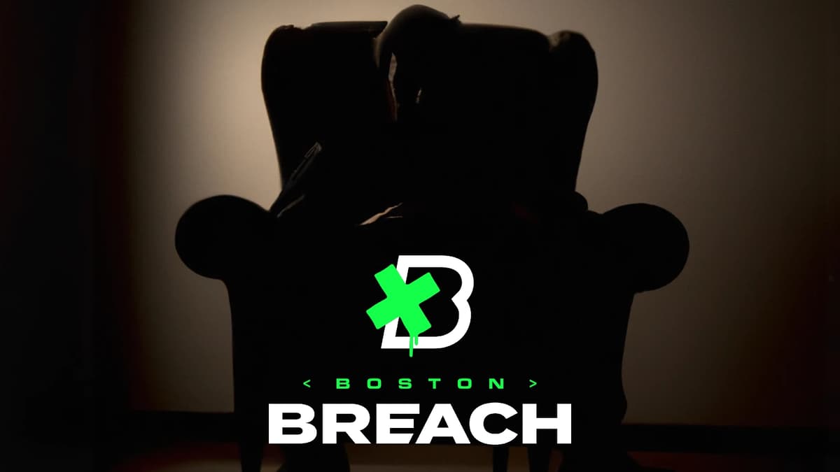 Silhouette of a man in an armchair with a Boston Breach logo in the middle