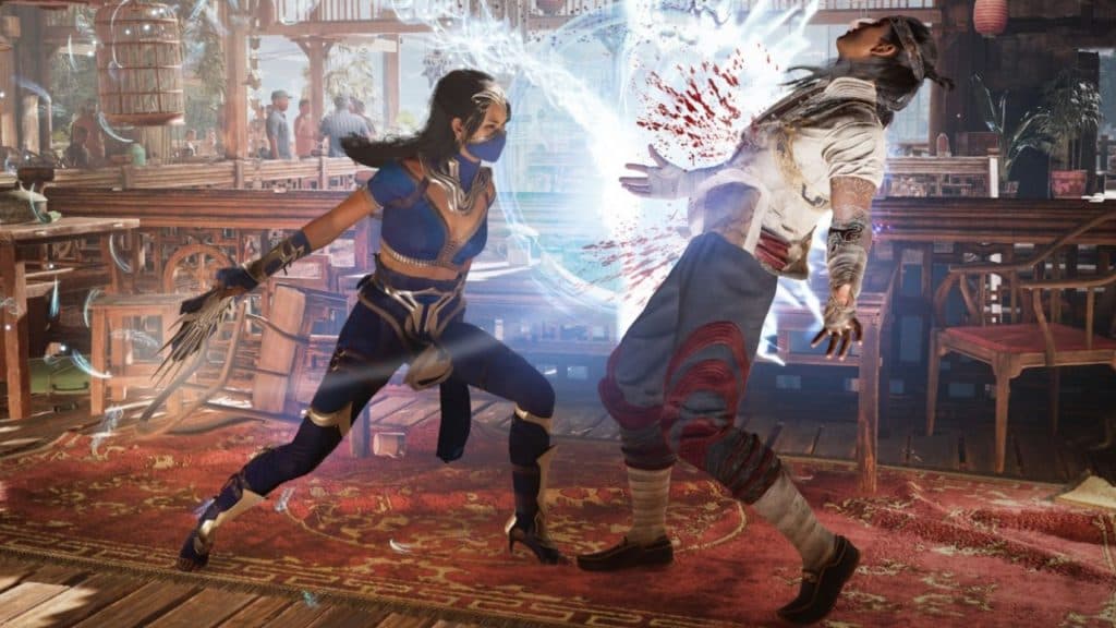 kitana attacking liu kang in mortal kombat 1