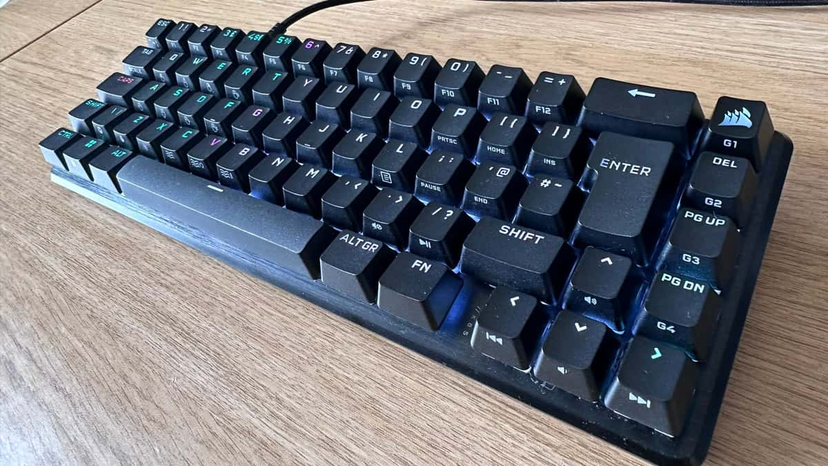 Corsair K65 Pro Mini with RGB on on a desk