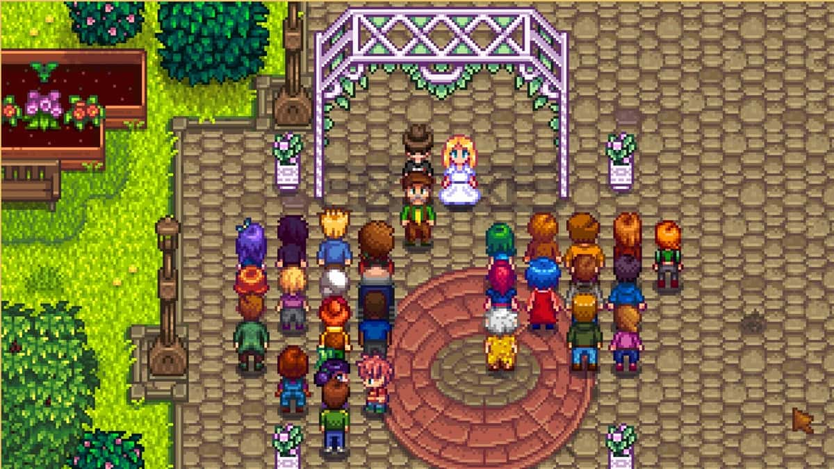 An image of players getting married in Stardew Valley.