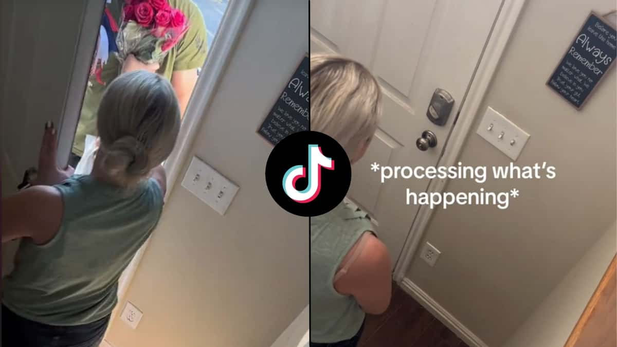 Woman stood behind door with flowers with tiktok logo