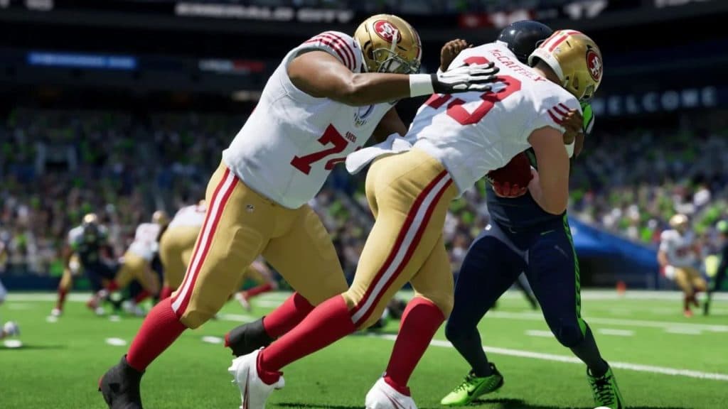 nfl madden 24 players tackling ball runner