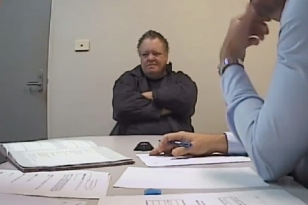 Still of Scott White's police interrogation