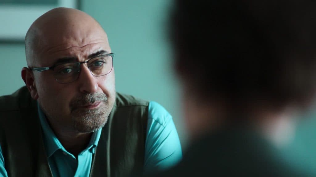 Özgür Karadeniz in Dear Child as Dr. Hamstedt.