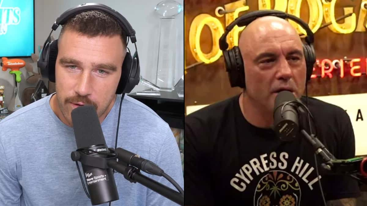 Travis Kelce talking into mic side-by-side with Joe Rogan in podcast studio