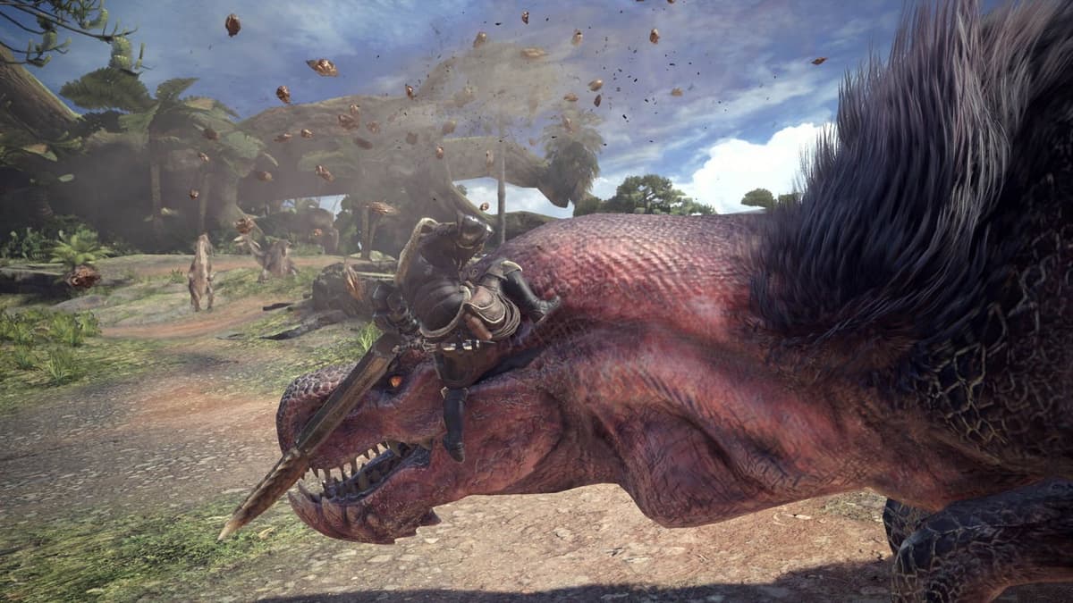 A Hunter climbing onto Anjanath's head in Monster Hunter World