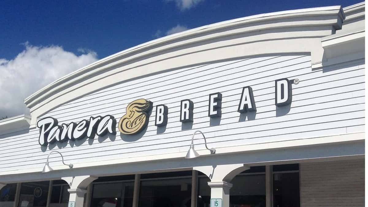 Image shows the outside view of a Panera Bread restaurant.