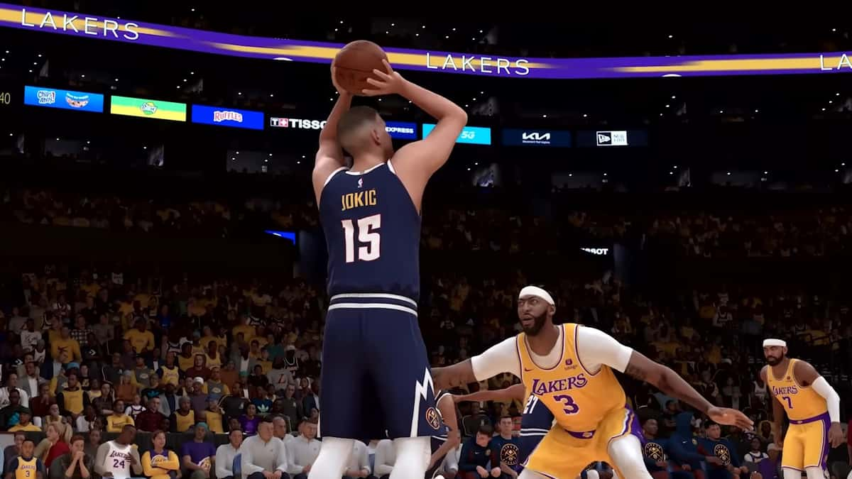 Nikola Jokic shooting a three over Anthony Davis in NBA 2K24.