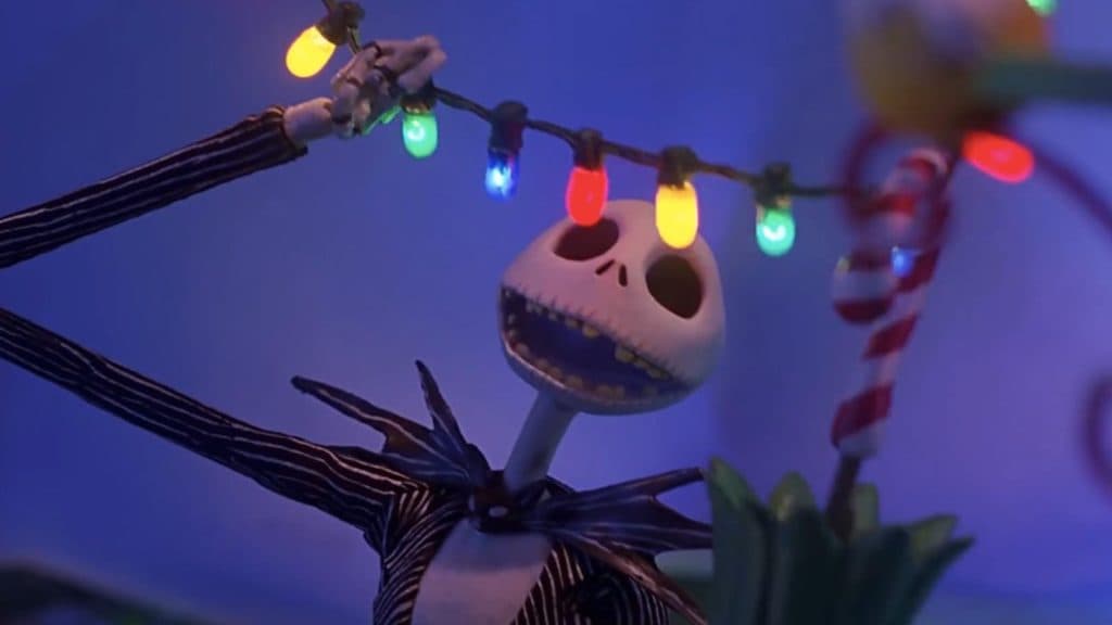 Jack Skellington holds Christmas lights