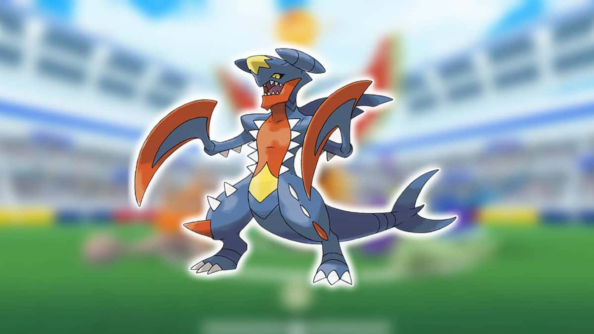 Mega Garchomp appears against a blurred background