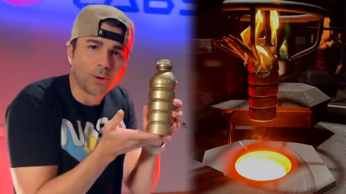 Mark Rober holding $500K Gold Prime bottle