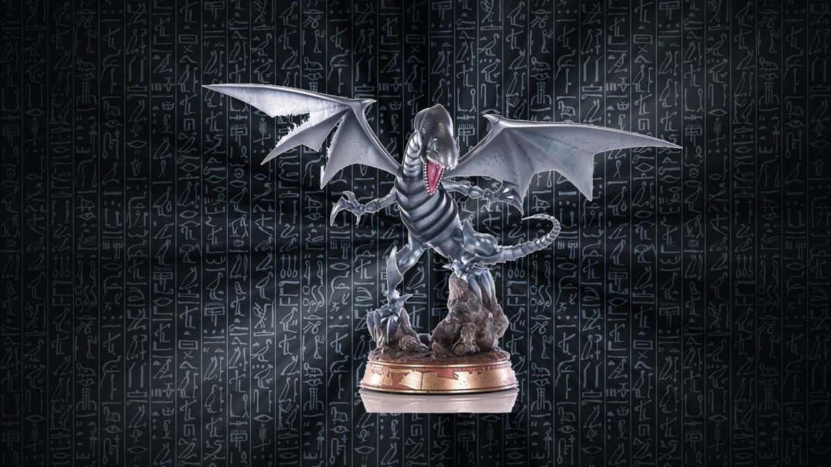 Yu-Gi-Oh Blue Eyes White Dragon statue on black background