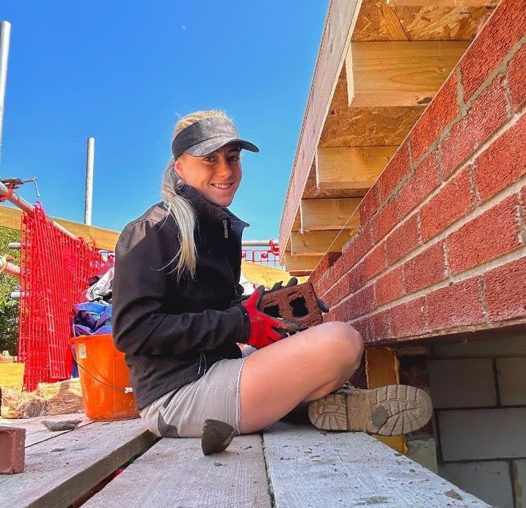 Darcie bricklaying