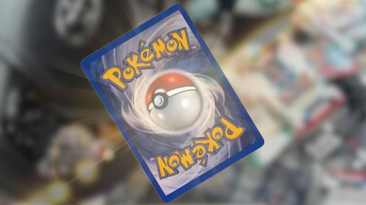 The reverse of a Pokemon card on top of a background showing a car full of empty card packets