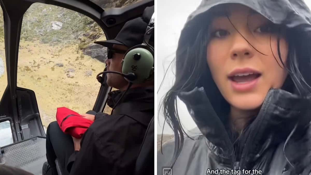 woman gets hand delivered a new north face raincoat on mountaintop