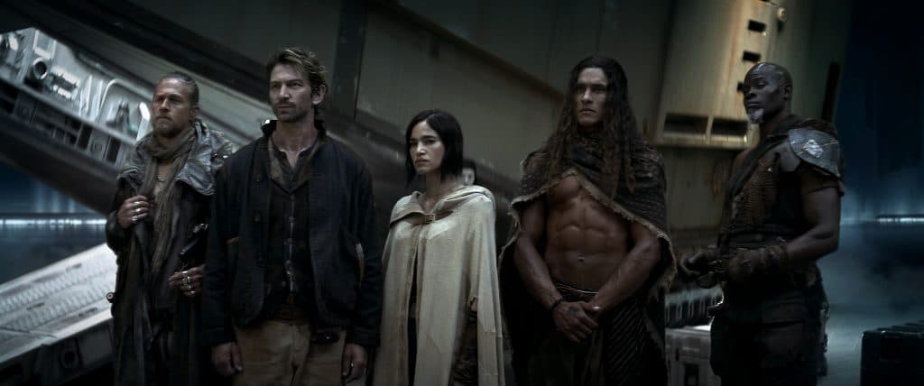 Charlie Hunnam as Kai, Michiel Huisman as Gunnar, Sofia Boutella as Kora, Staz Nair as Tarak and Djimon Hounsou as Titus in Rebel Moon