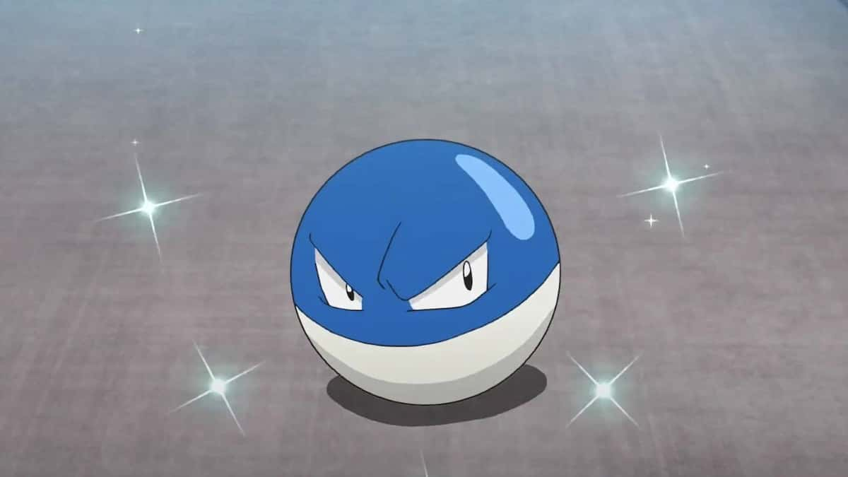 A shiny Voltorb is sat on a path