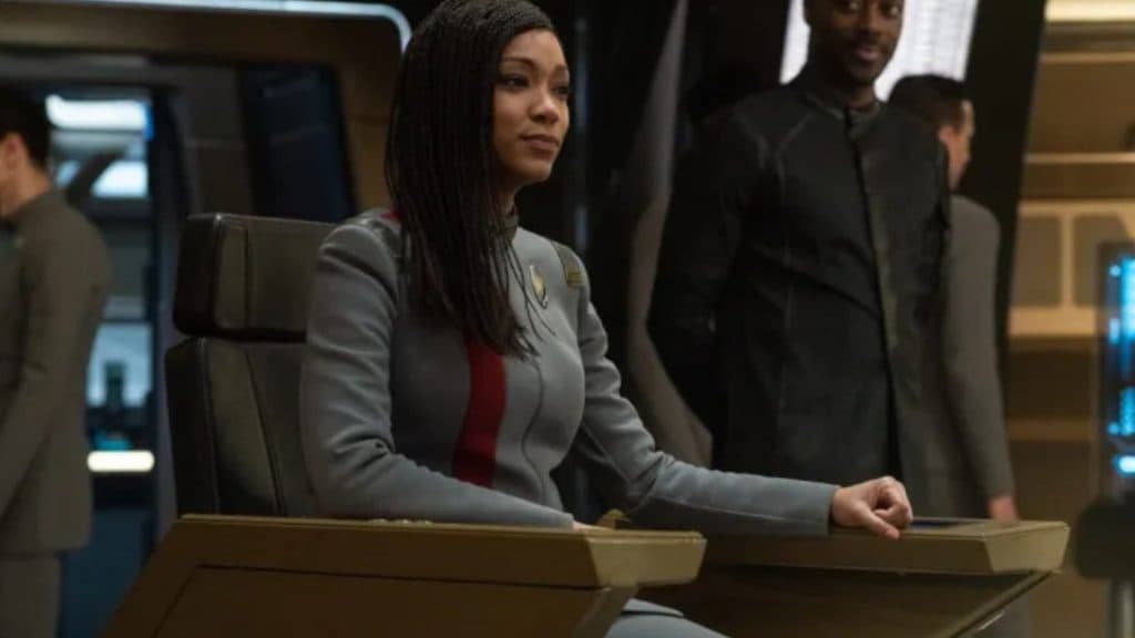 Captain Michael Burnham sis on the bridge of the USS Discovery.