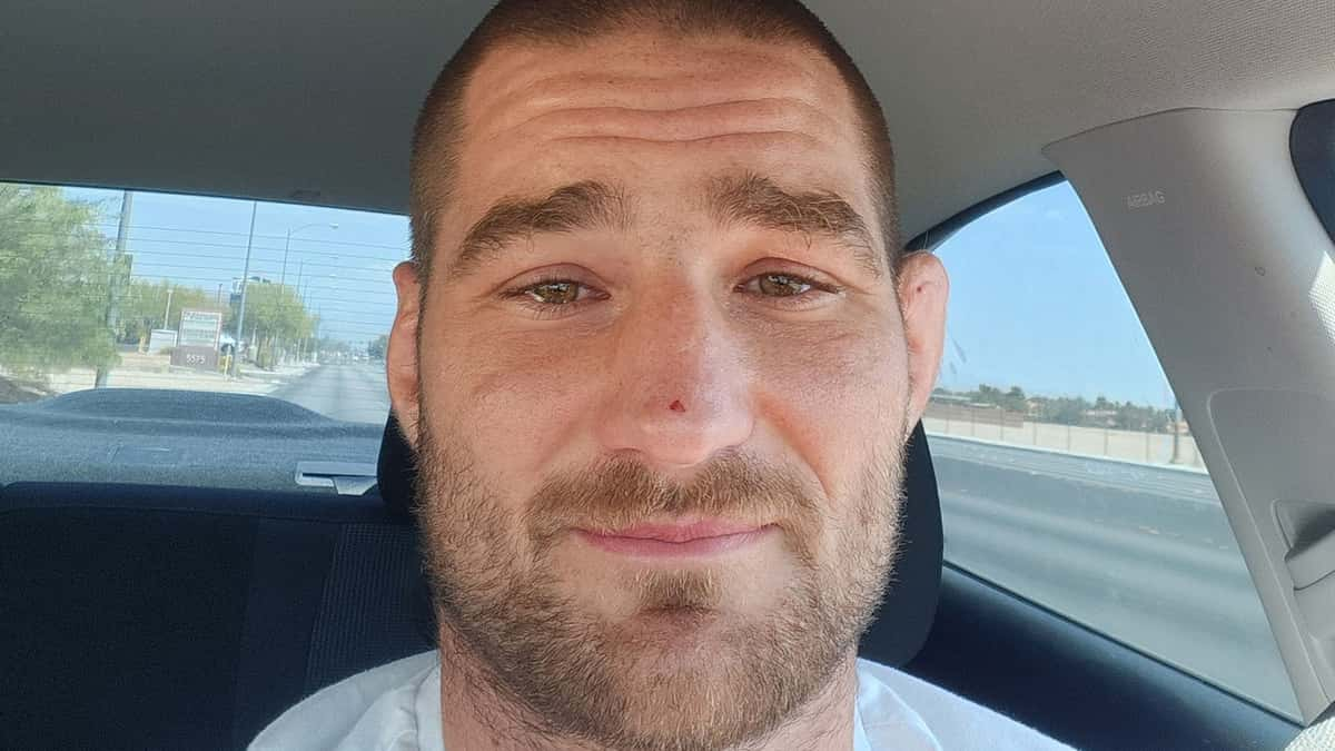 UFC fighter Sean Strickland sat in a car