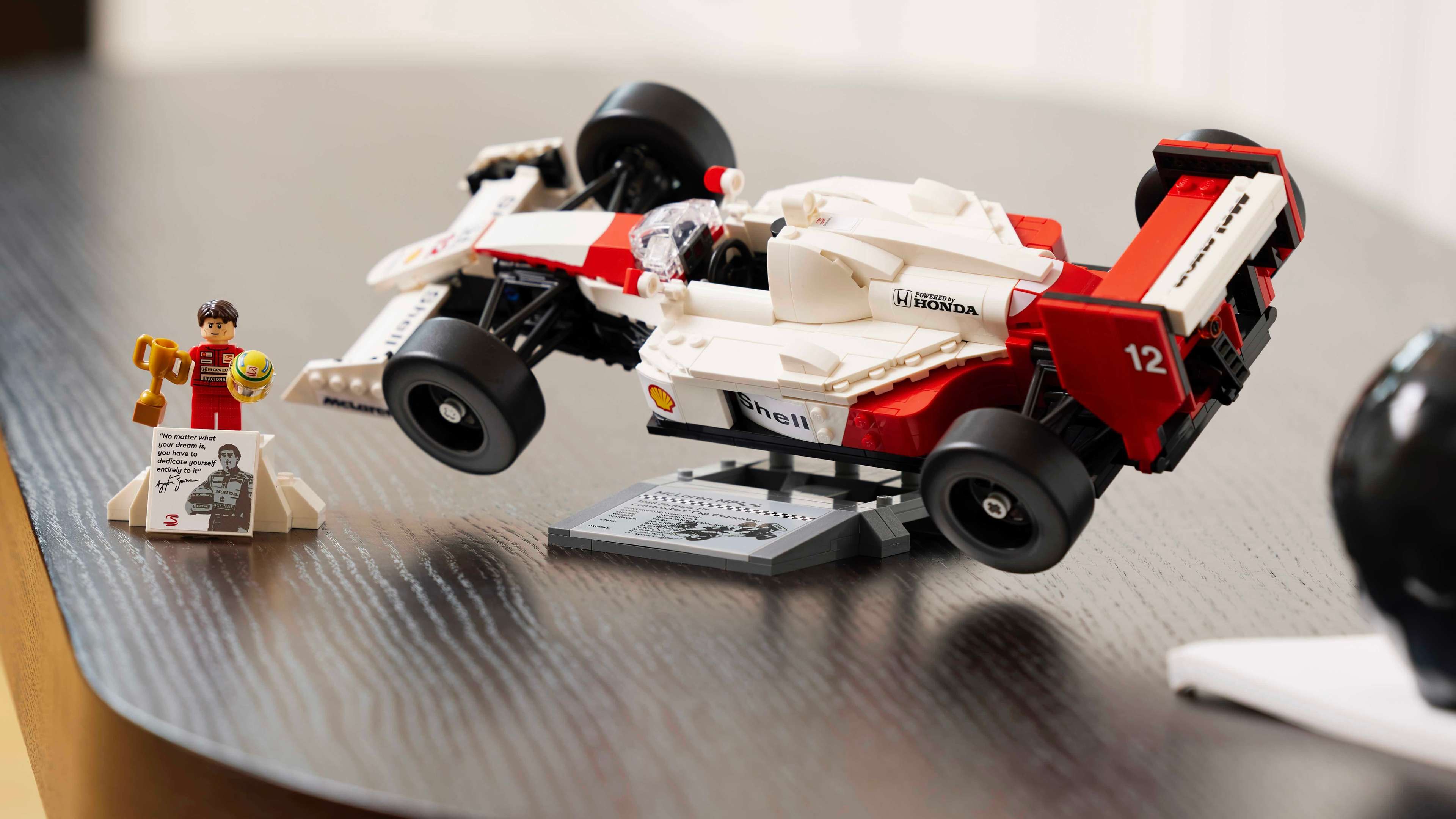 The LEGO Icons McLaren MP4/4 on display with Ayrton Senna minifigure