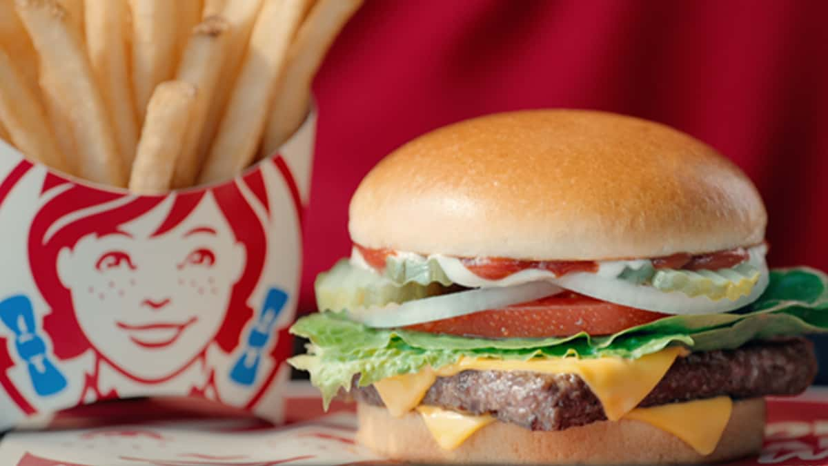 wendy's burger and fries on table