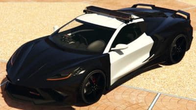 Police livery Coquette D10 Pursuit parked on sidewalk in GTA Online