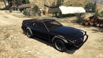 Black Vapid Dominator Arena parked on sand in GTA Online