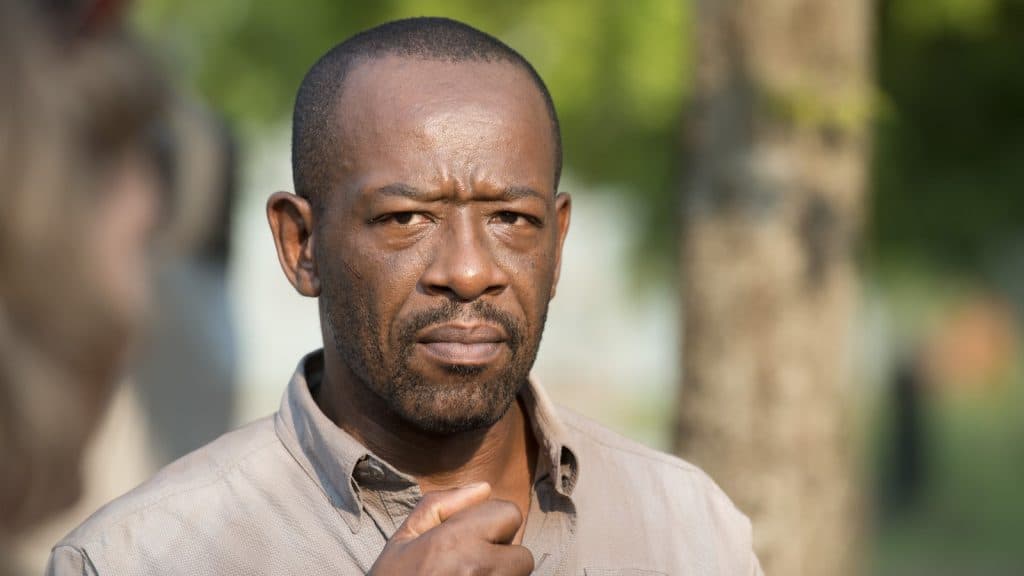 Lennie James as Morgan on The Walking Dead, wearing a grey shirt and looking concerned