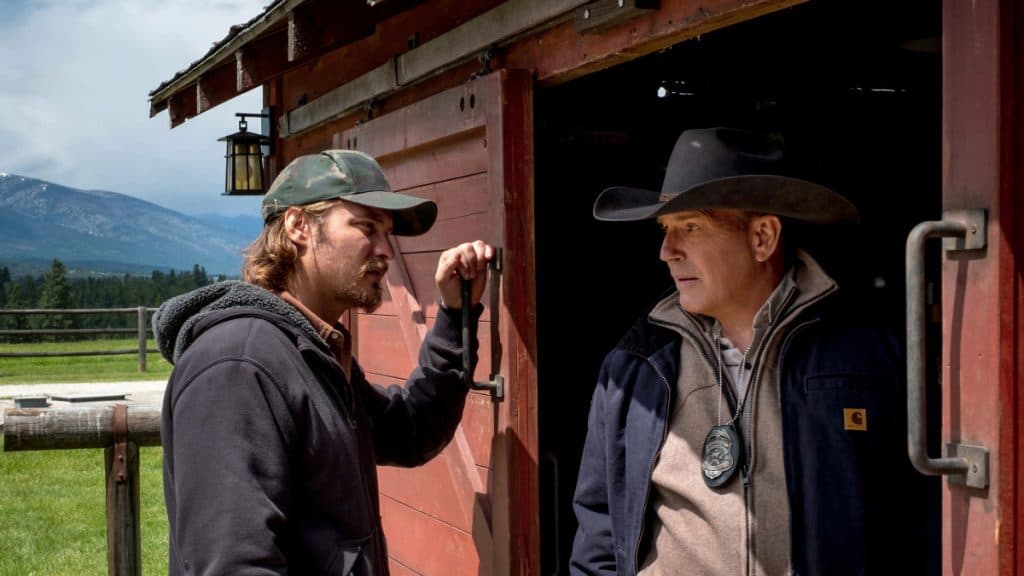 Yellowstone seasons ranked by Rotten Tomatoes scores: Kayce and John standing outside a barn