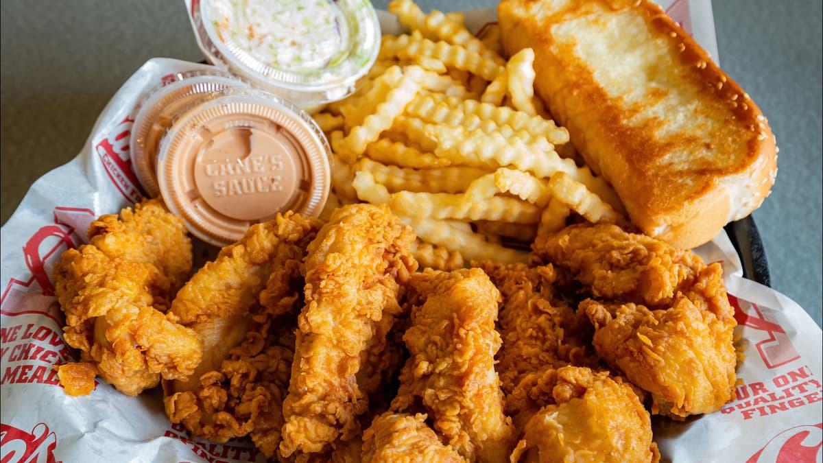 A photo of friend chicken, fries and a drink