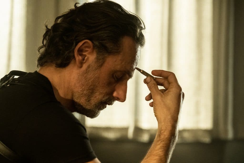 The Ones Who Live episode 4 recap: Andrew Lincoln as Rick Grimes holding a bullet to his head